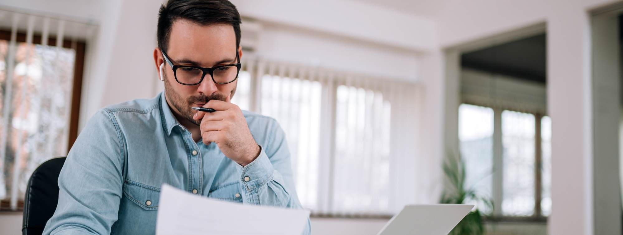 Man reading in office