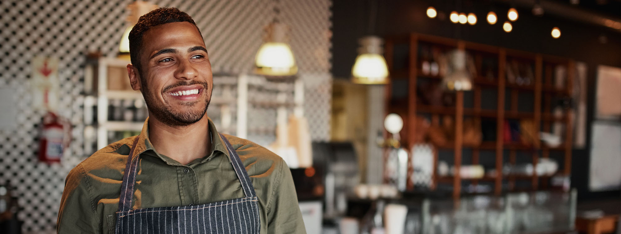 Small business owner smiling