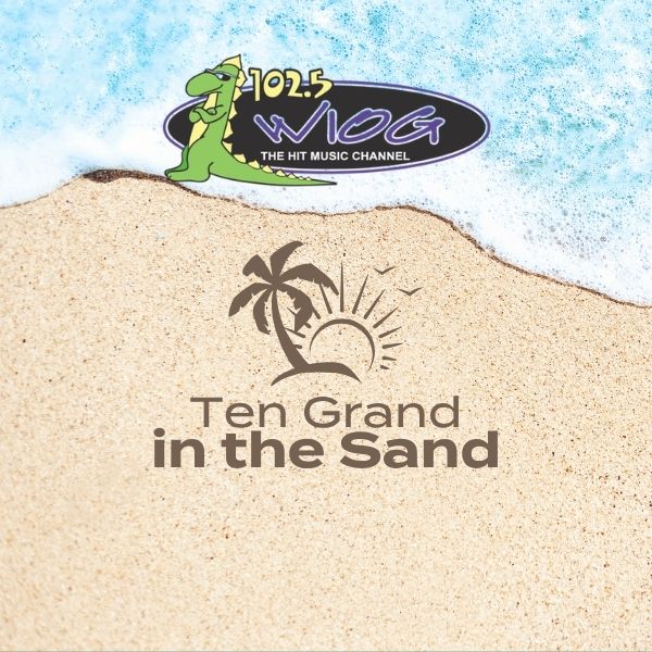The Ten Grand in the Sand logo on a backdrop of a sandy beach