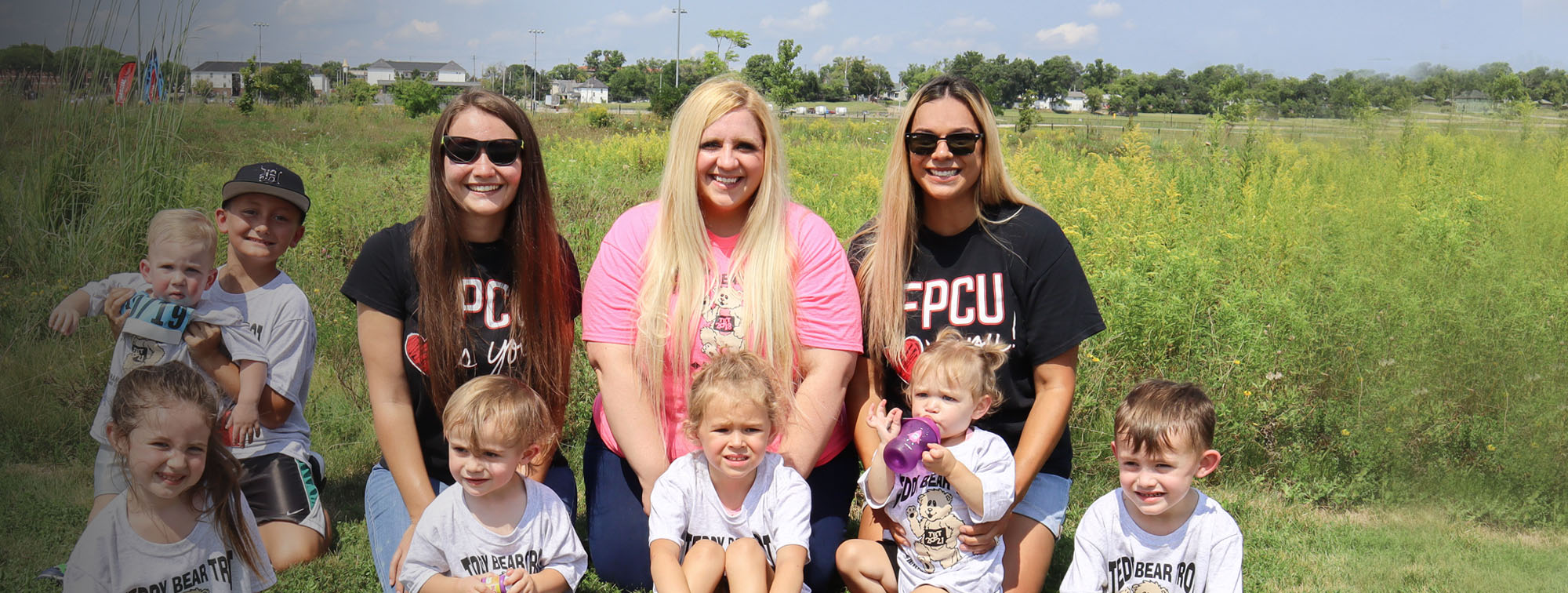 Financial Plus Credit Union employees partaking in a community event
