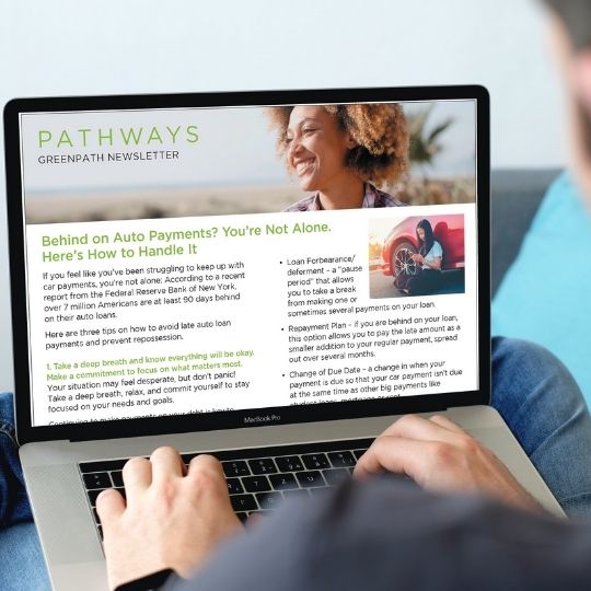 Newsletter displayed on a laptop