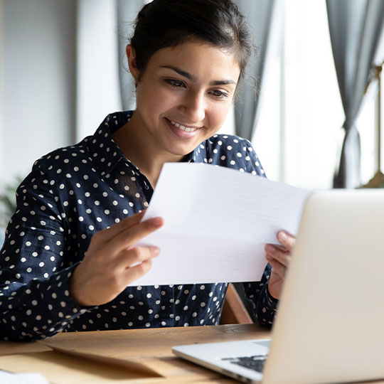 Woman reading flyer