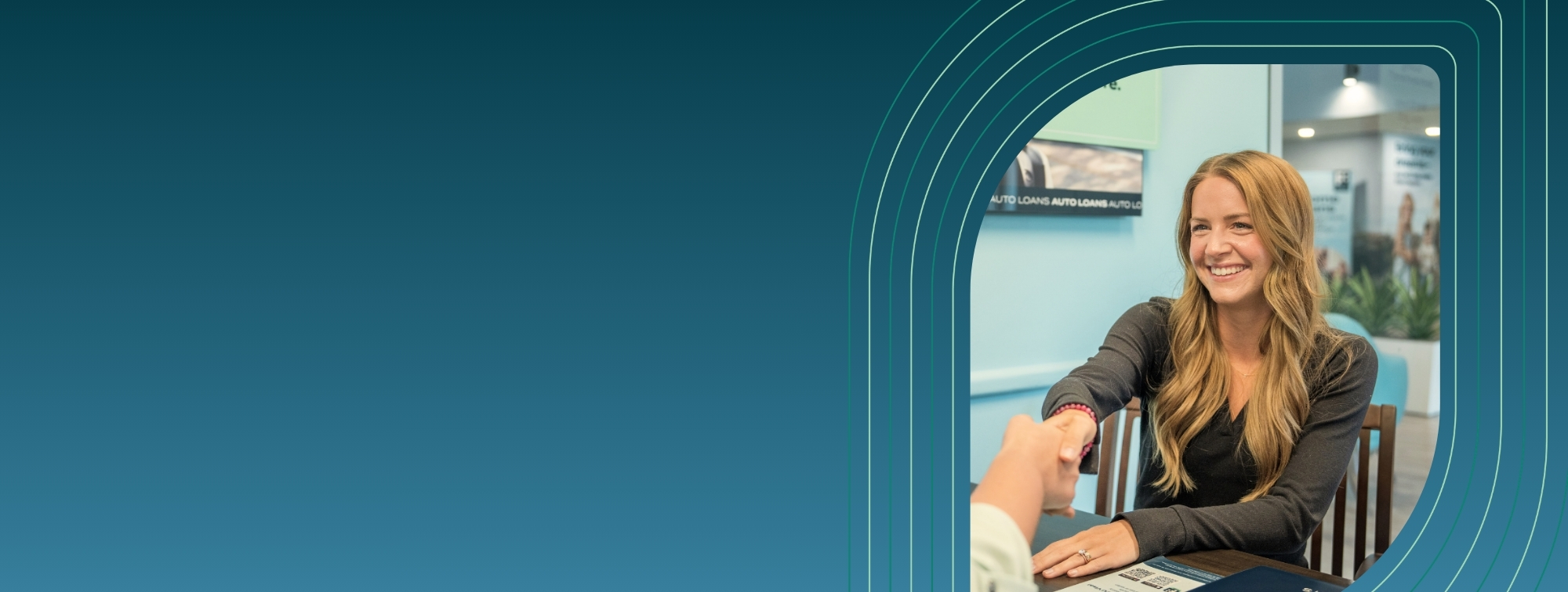 A woman opening a CD at a Financial Plus Credit Union Branch