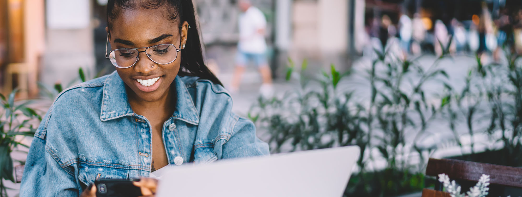 Young woman using online banking on her computer