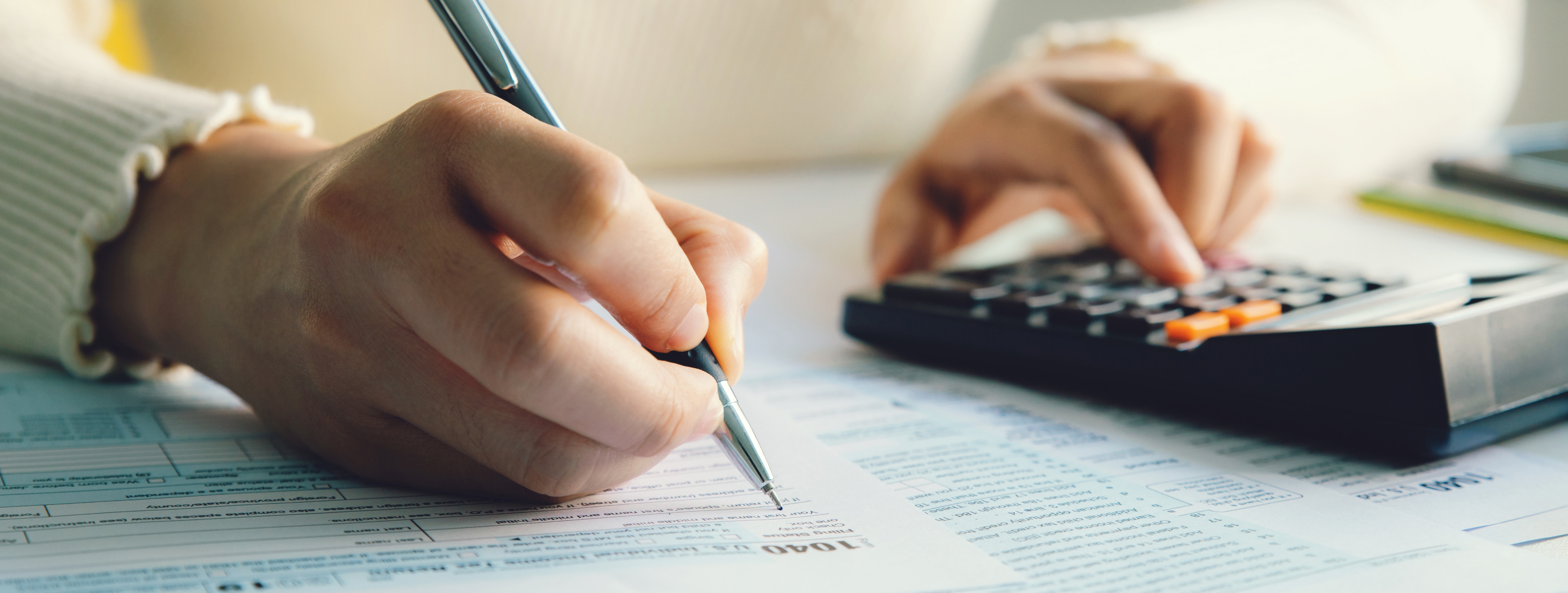 person calculating taxes