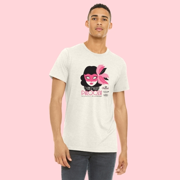 a man wearing a pink night palooza shirt