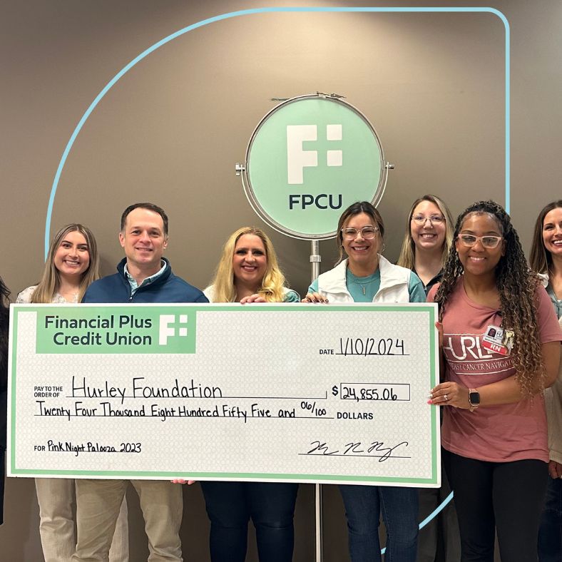 FPCU team presenting check to the Hurley Foundation for the 2023 Pink Night Palooza campaign.