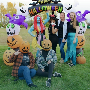 Financial Plus Credit Union employees dressed up for Trunk-or-Treat