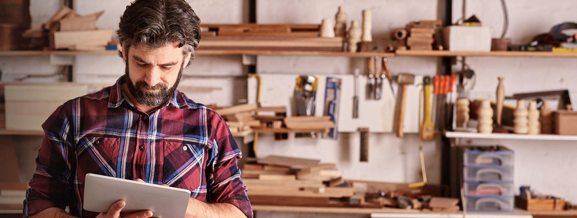 Small business owner using a tablet