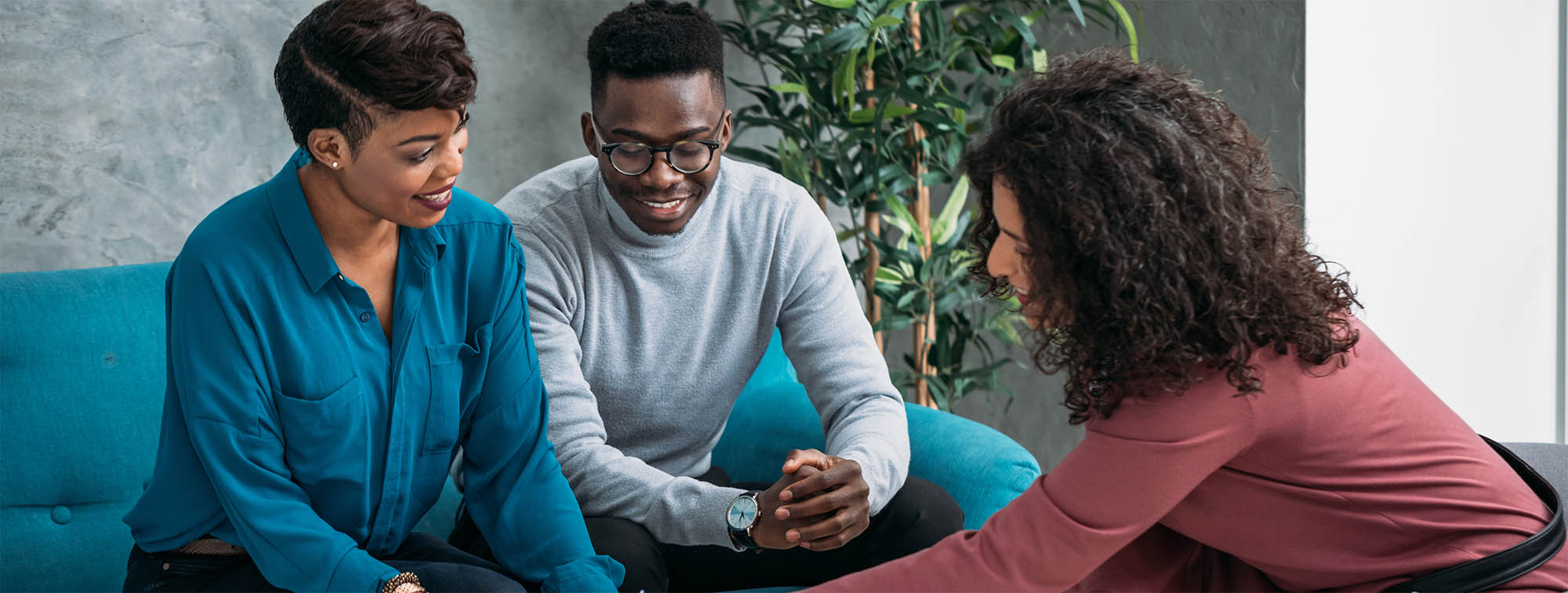 financial coach talking to couple