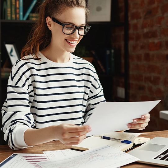 Woman reading over documents