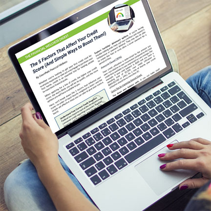 Credit score article displayed on laptop