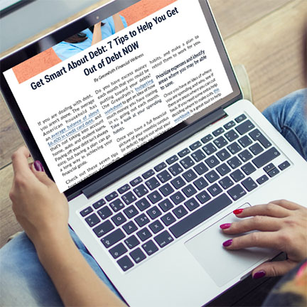 Article on laptop about how to get out of debt