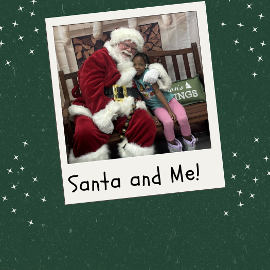 child taking picture with santa