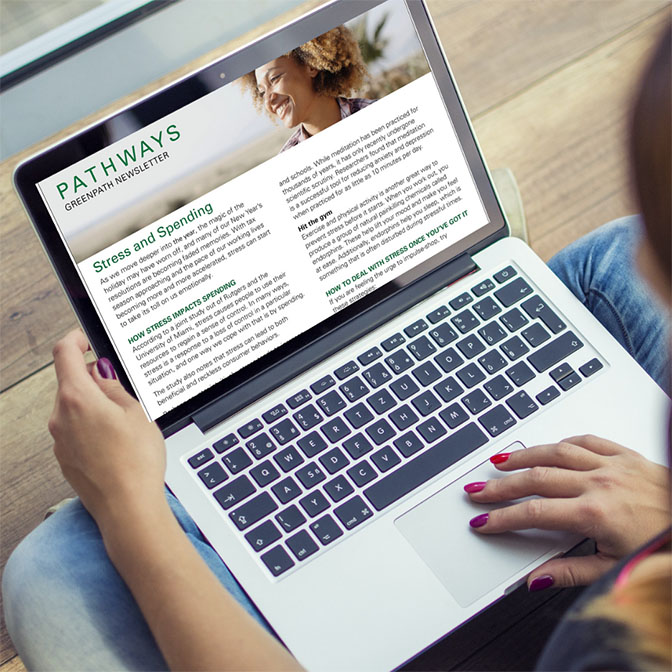 Financial article on laptop
